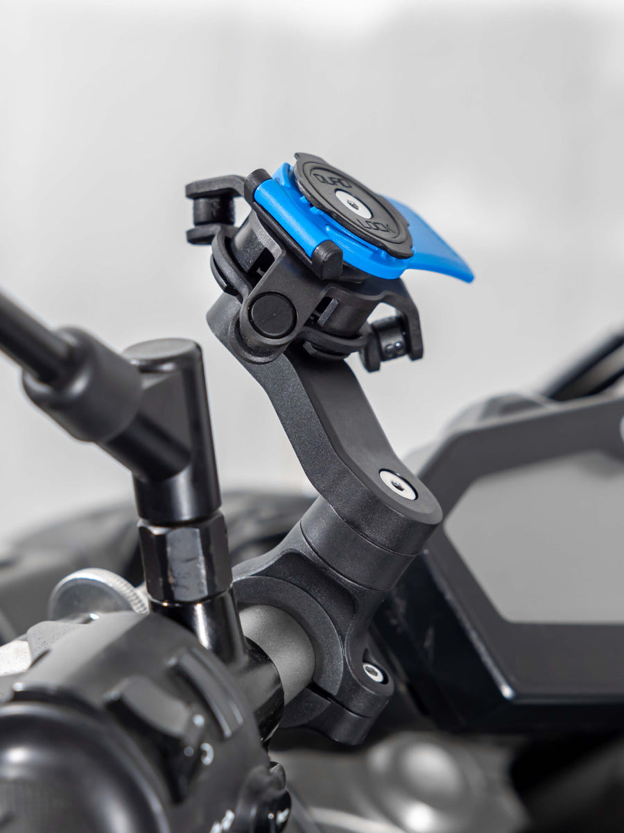 Photograph of the Handlebar Mount with a Vibration Dampener attached on the handlebars of a motorbike