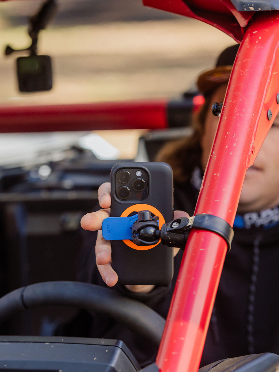 Roll Cage Hose Clamp Base and Action Camera Head with an action camera mounted on a roll cage ba